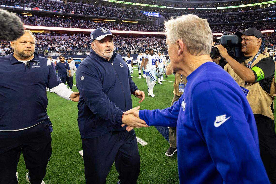 Cowboys Head Coach Mike McCarthy and Seahawks Head Coach Pete Carroll shake hands after an NFL game between the Dallas Cowboys and the Seattle Seahawks at AT&T Stadium in Arlington on Thursday, Nov. 30, 2023. The Cowboys came out on top 41-35.