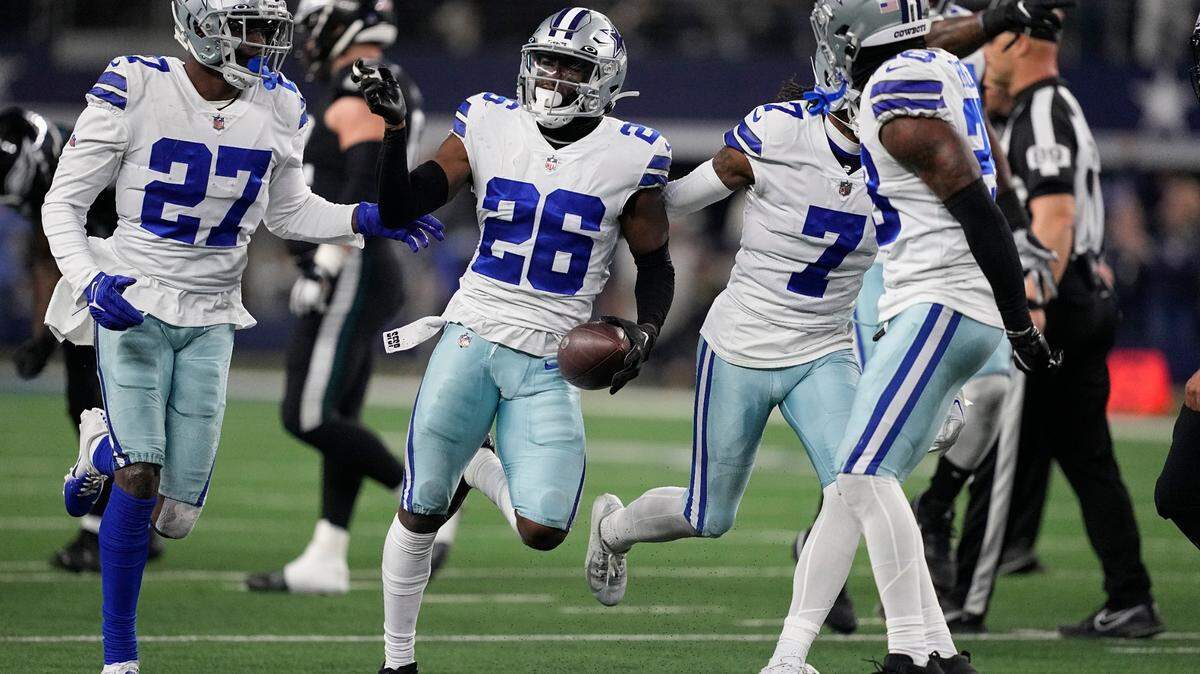 Dallas Cowboys’ DaRon Bland celebrates his interception against the Philadelphia Eagles on Saturday at AT&T Stadium.