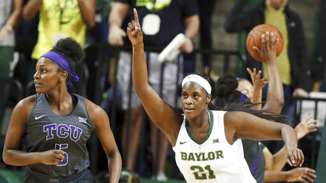 Baylor center Kalani Brown, right, reacts to her score while heading up court with TCU forward Yummy Morris, left, in the first half of an NCAA college basketball game, Saturday, Feb. 9, 2019, in Waco, Texas. (AP Photo/Rod Aydelotte)
