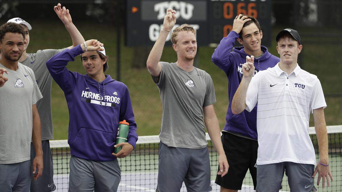 TCU tennis team members salute the home crowd after defeating Columbia at the Bayard H. Friedman Tennis Center in Fort Worth, Texas on March 28, 2018. (Photo/Gregg Ellman )