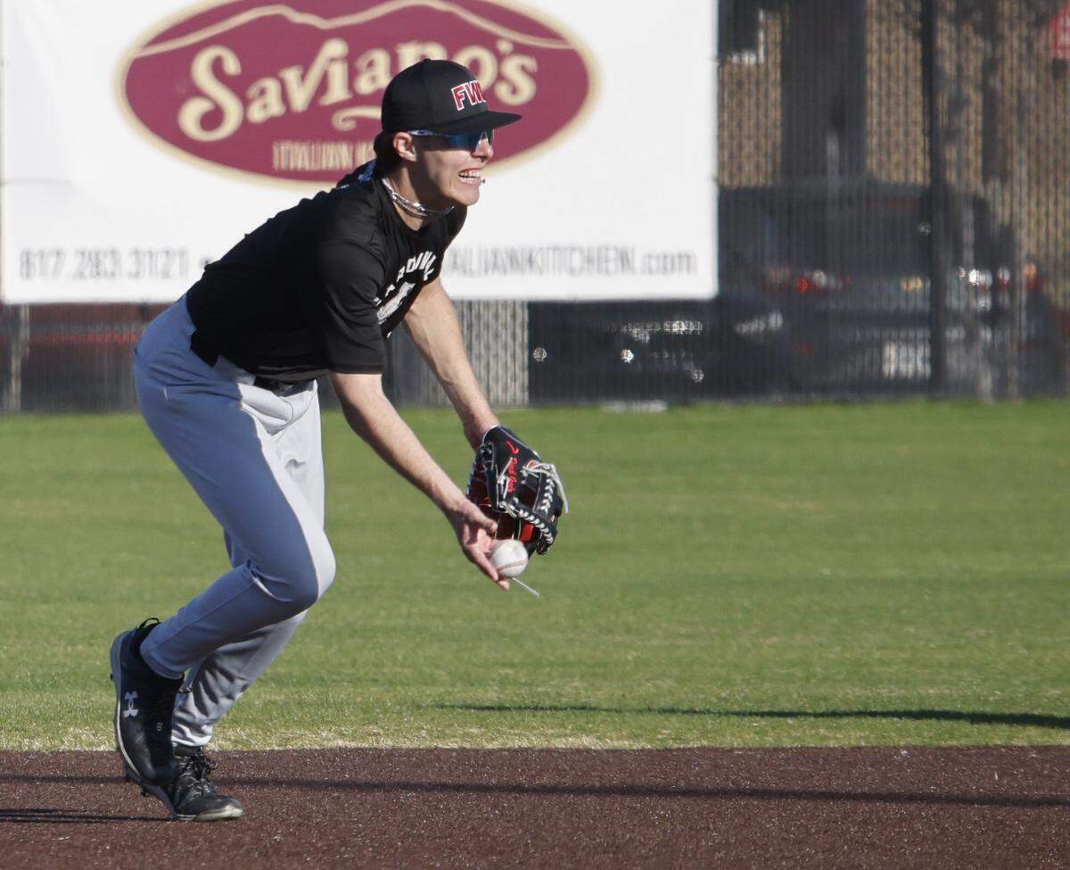 Fort Worth Christian short stop Grady Emerson puts the soft touch on a ball to second base during baseball practice at Fort Worth Christian School in North Richland Hills, Texas, Monday Feb. 23, 2026.