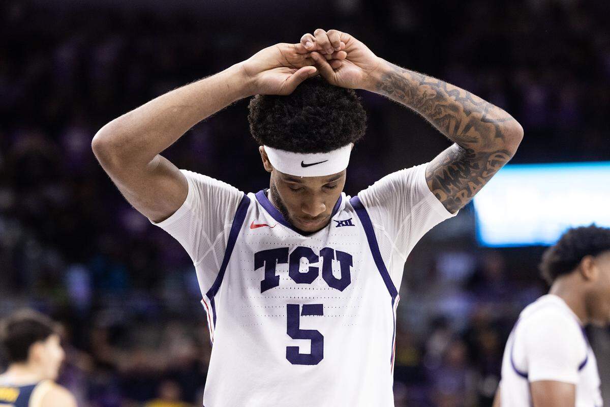 TCU guard Micah Robinson (5) reacts after a turnover in the second half of a NCAA basketball game between the TCU Horned Frogs and the Michigan Wolverines at Schollmaier Arena in Fort Worth on Friday, Nov.14, 2025.