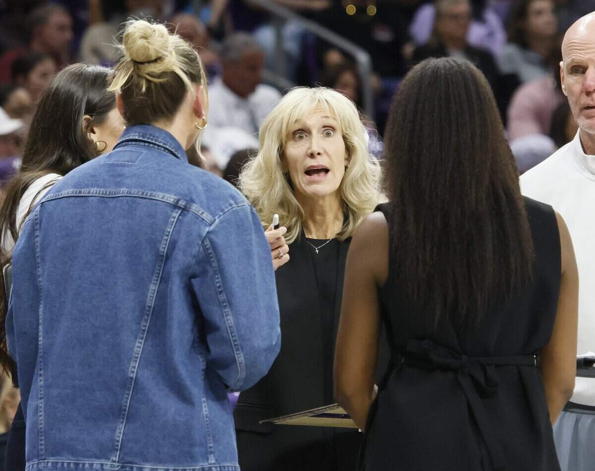 Washington head coach Tina Langley talks to her staff during a game against TCU in the second half of a second round NCAA Division I Women's Basketball Championship game at Schollmeier Arena in Fort Worth, Texas, Sunday, March, 22, 2026.