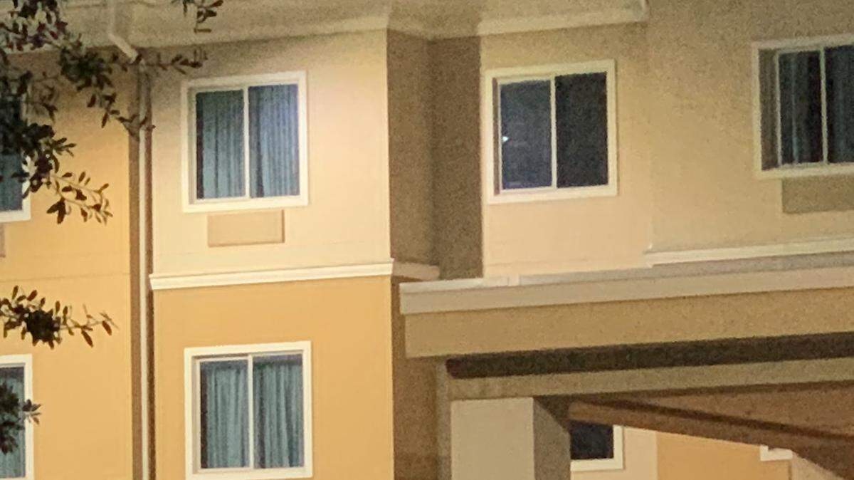 A look at the third story of a Comfort Suites in south Fort Worth, where a man jumped from a window early Tuesday morning to evade arrest before he fled from officers and fired in the direction of them, police said. He was taken into custody following a roughly 45-minute standoff.