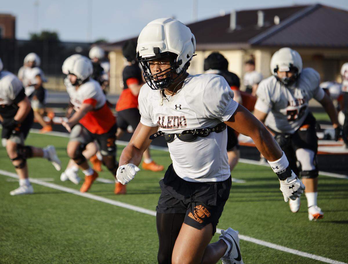 Wide Receiver Kaydon Finley goes through drills during Aledo High School's morning practice at Tim Buchanan Stadium in Aledo, Texas, Monday August, 18, 2025.