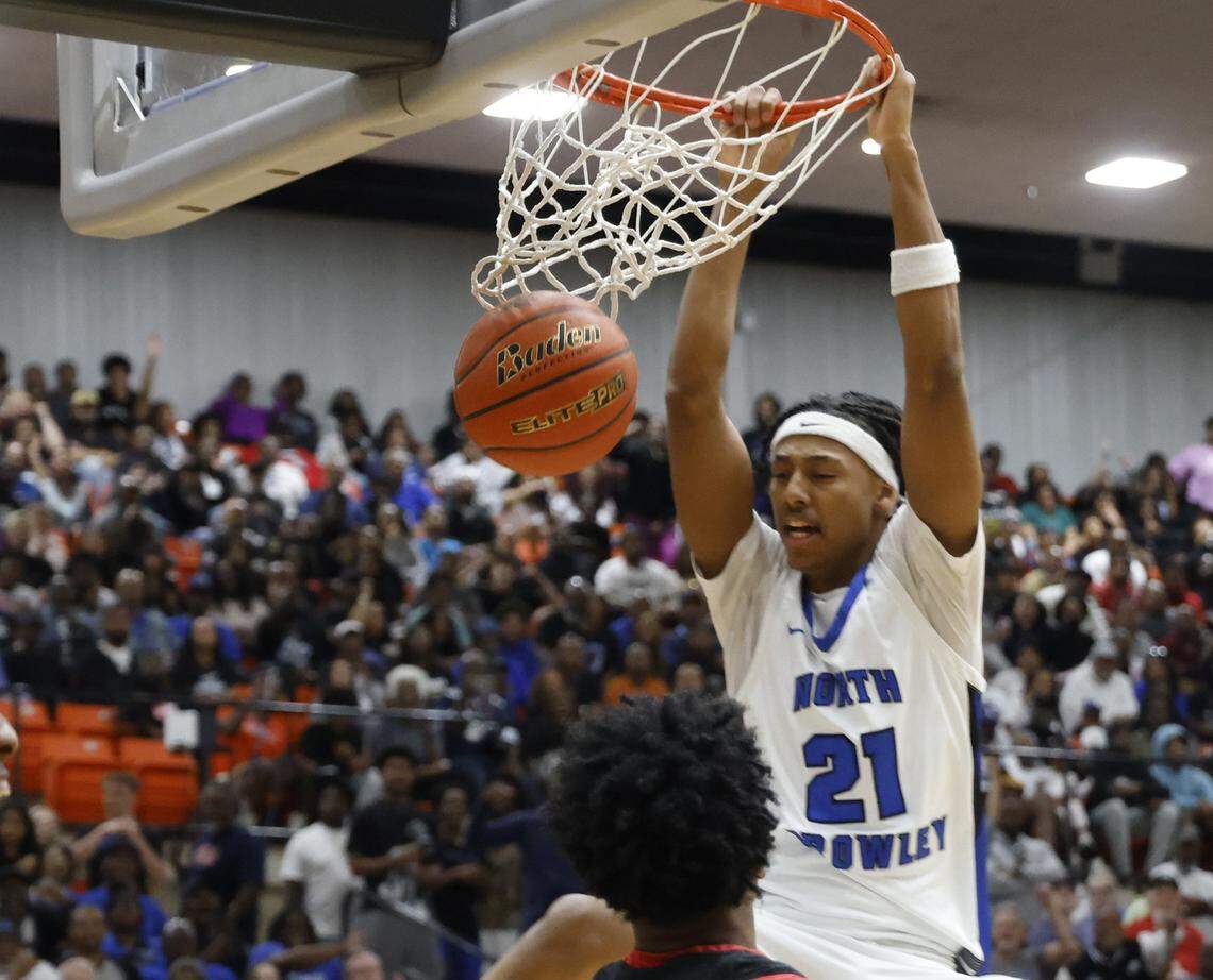 North Crowley wing Jonathan Fox (21) rim hangs against Duncanville during the first half of a UIL Class 6A Division I boys semifinal basketball game at Wilkerson Greines Activity Center in Fort Worth, Texas, Monday, Mar. 10, 2026.