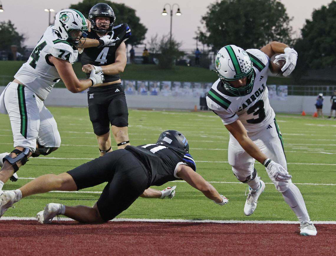Southlake running back Davis Penn (3) scores for the Dragons during the first half of a UIL football game between Southlake Carroll  and Byron Nelson at Northwest ISD Stadium in Justin, Texas, Friday, Sept. 12, 2025.