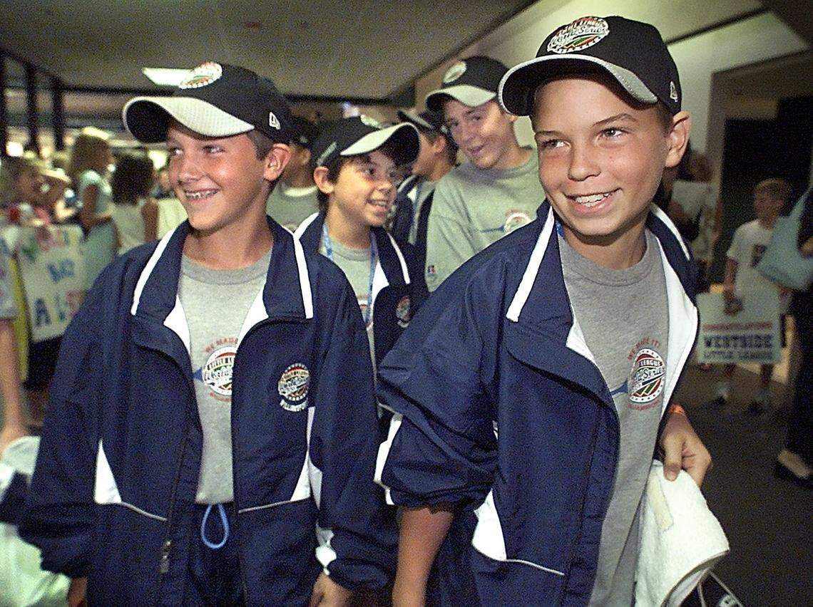 In Aug. of 2002 members of the Westside All-Stars Patton Eagle, 12, left, Robbby Lebus, 11, Jack Huckabay, 12, and Mark Grace, 12, returned to DFW after playing in the Little League World Series. Their season and run to the LLWS is becoming a Hollywood motion picture starring Luke Wilson and Greg Kinnear.