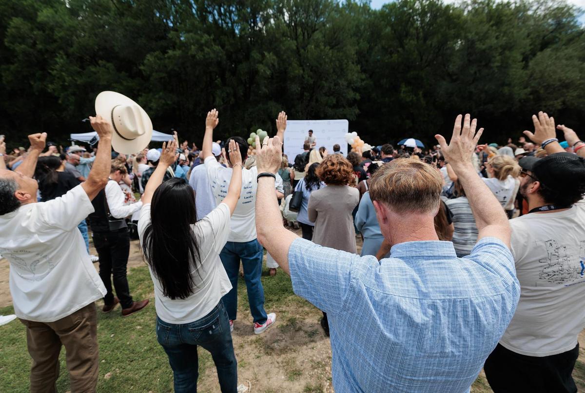 Guests pray during the groundbreaking of Mercy Culture Church’s Justice Residences on Friday, May 9, 2025, in Fort Worth. The 100-bed shelter is part of Mercy Culture’s Justice Reform ministry that combats human trafficking.
