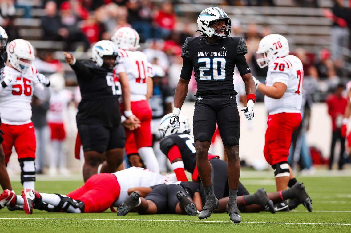 North Crowley linebacker Brock Lacy screams in celebration after forcing a fumble in a Class 6A Division I regional playoff Saturday, Nov. 29, 2025, at Midlothian ISD Stadium in Midlothian.
