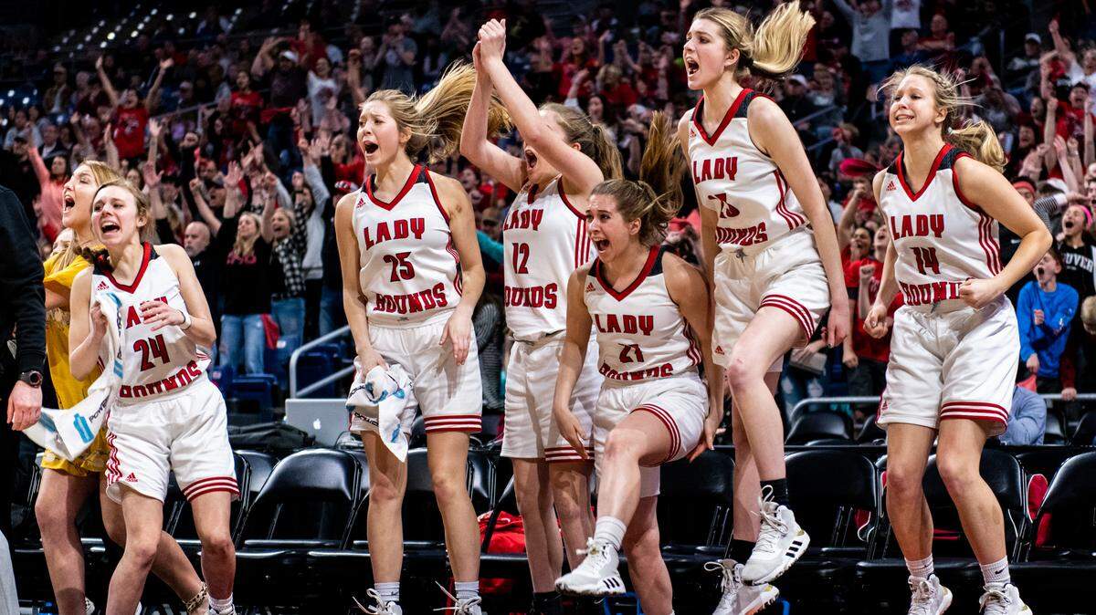 The Lady Hounds jump to their feet as they take the lead near the end of the 4th quarter of the 2A State Championship game between Gruver and Muenster at the Alamodome in San Antonio on March 7th, 2020.