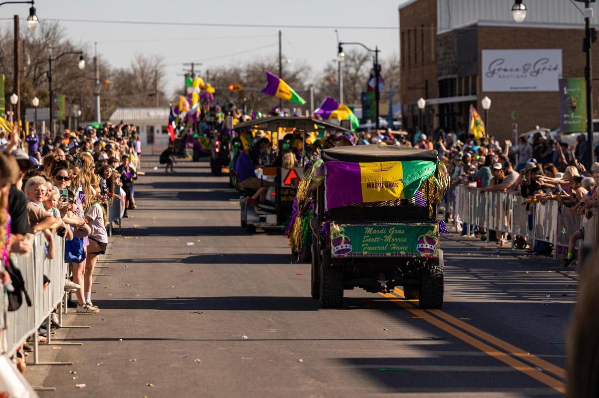 Parade floats make their way down Clay Street for the big parade during the 15th Annual Mardi Gras Nocona Style on Clay Street in Nocona on Saturday, Mar. 1, 2025.