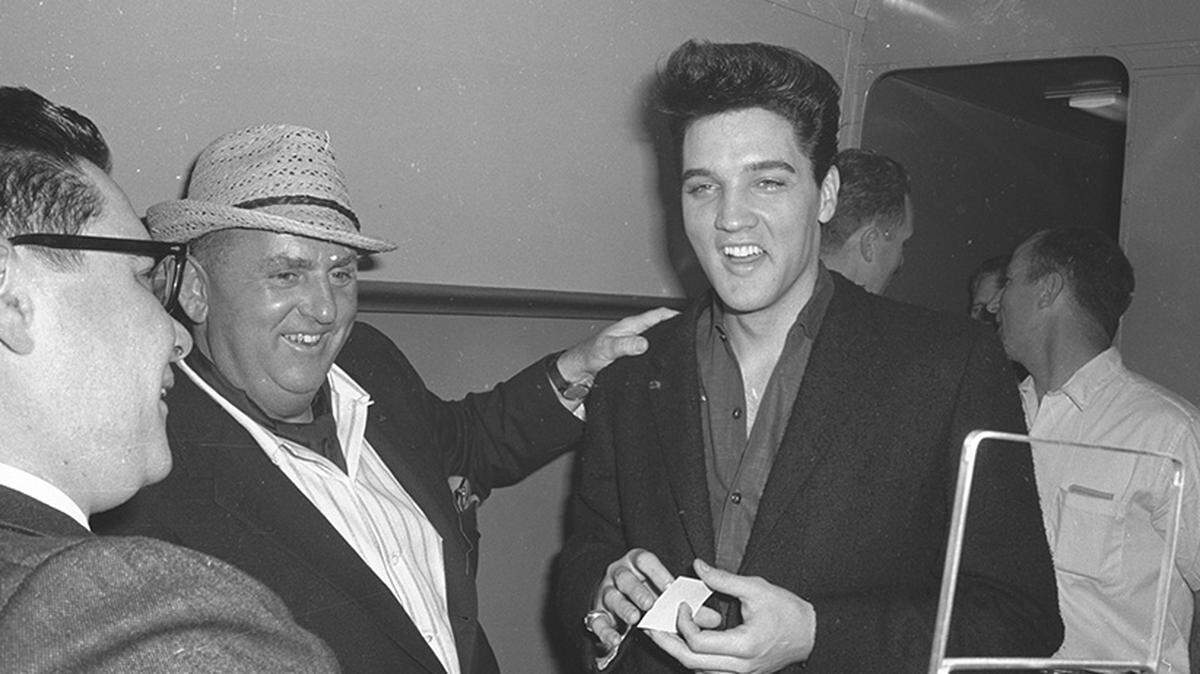 April 19, 1960: Elvis Presley with Col. Tom Parker at the T&P train station in Fort Worth during a layover en route to Hollywood to make the movie “G.I. Blues.”