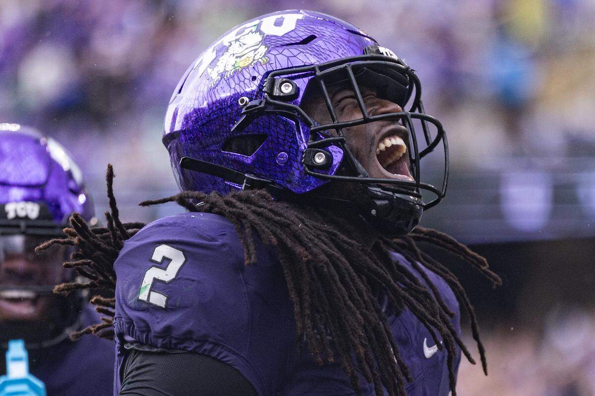 TCU running back Kevorian Barnes (2) celebrates after scoring a 5-yard touchdown in the second quarter to put the Horned Frogs ahead 14-7.