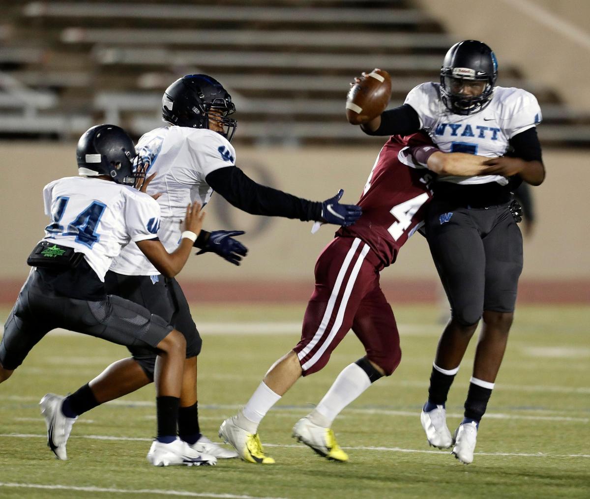 North Side defensive lineman Brandon Gandara (44) sacks O.D. Wyatt quarterback Kaid Barrett (5) during a high school football game at Farrington Field in Fort Worth Texas, Friday, Oct. 30, 2020. North Side led 21-14 at the half. (Special to the Star-Telegram Bob Booth)