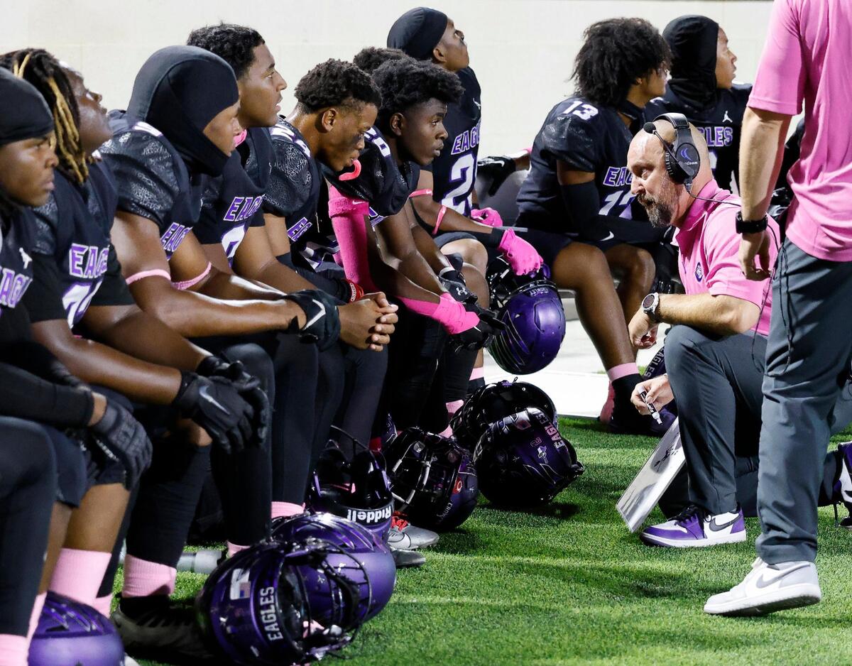 Assistant head coach Taylor Wolfe talks to the defensive unit in UIL high school football game at Crowley ISD Multi-Purpose Stadium in Crowley, Texas, Friday, Oct. 20, 2023.