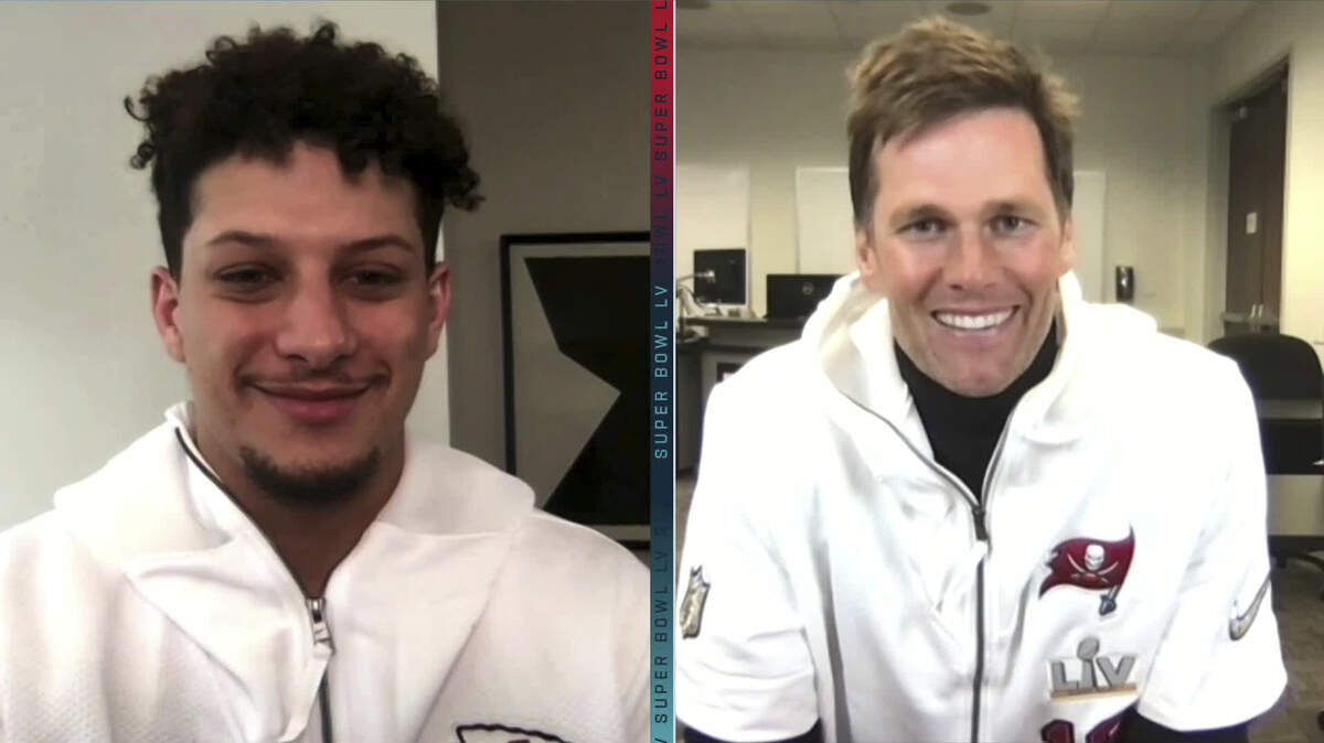 In this still image from video provided by the NFL, Kansas City Chiefs quarterback Patrick Mahomes, left, and Tampa Bay Buccaneers quarterback Tom Brady speak during Monday night’s opening press conferences for Super Bowl 55 on Sunday.