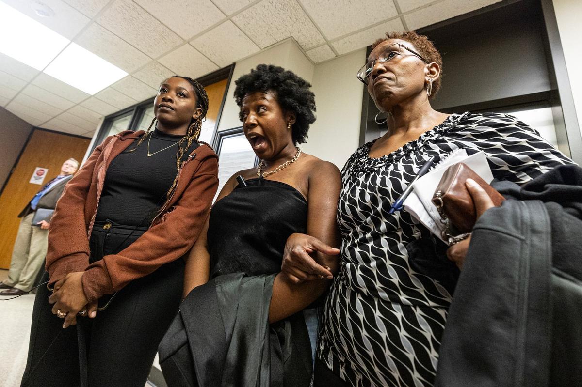 Anthony Johnson Jr.’s sisters Janell and Chanell Johnson and his mother, Jacqualyne, speak with the media gathered at the Tarrant County Commissioners Court meeting on May 7 to hear their comments regarding Anthony’s death while incarcerated.