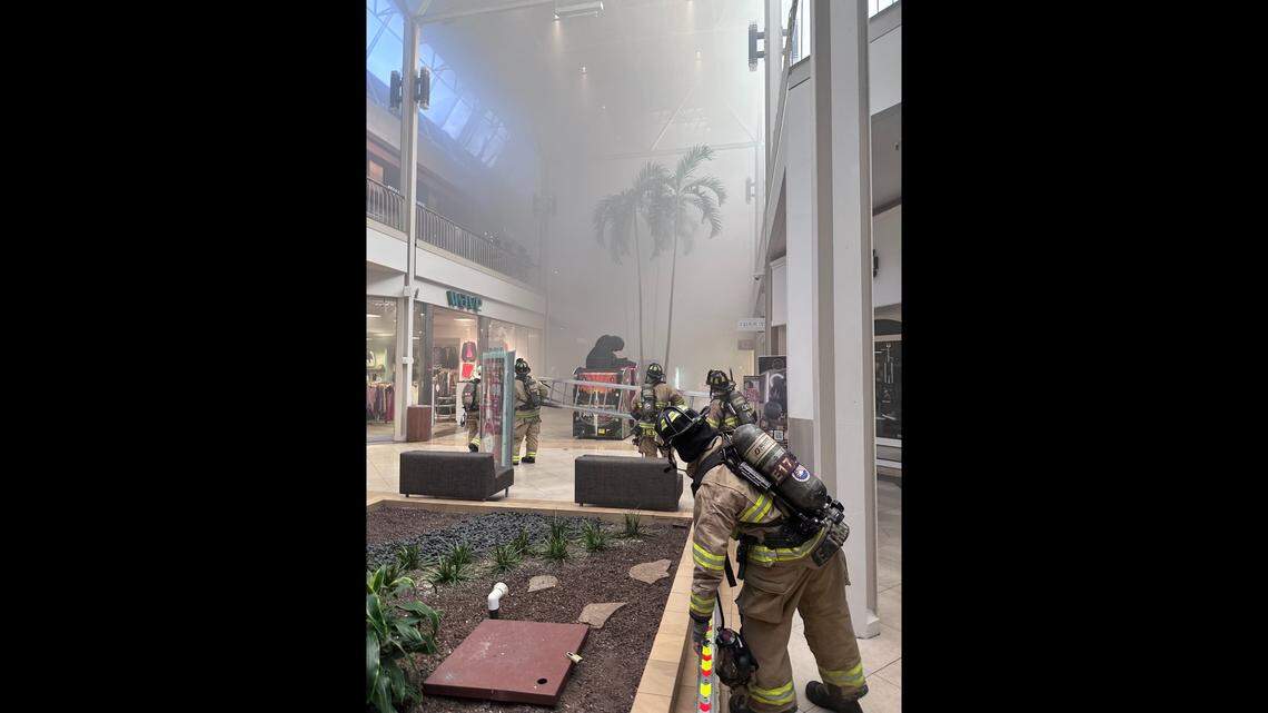 Fort Worth firefighters and police respond to a two-alarm fire at Hulen Mall on Friday night, June 27. Shoppers and employees were evacuated from the mall.
