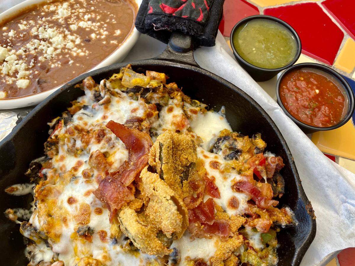 Migas come with a fried jalapeno at the Purple Frog Restaurant & Cantina on Blue Bonnet Circle.