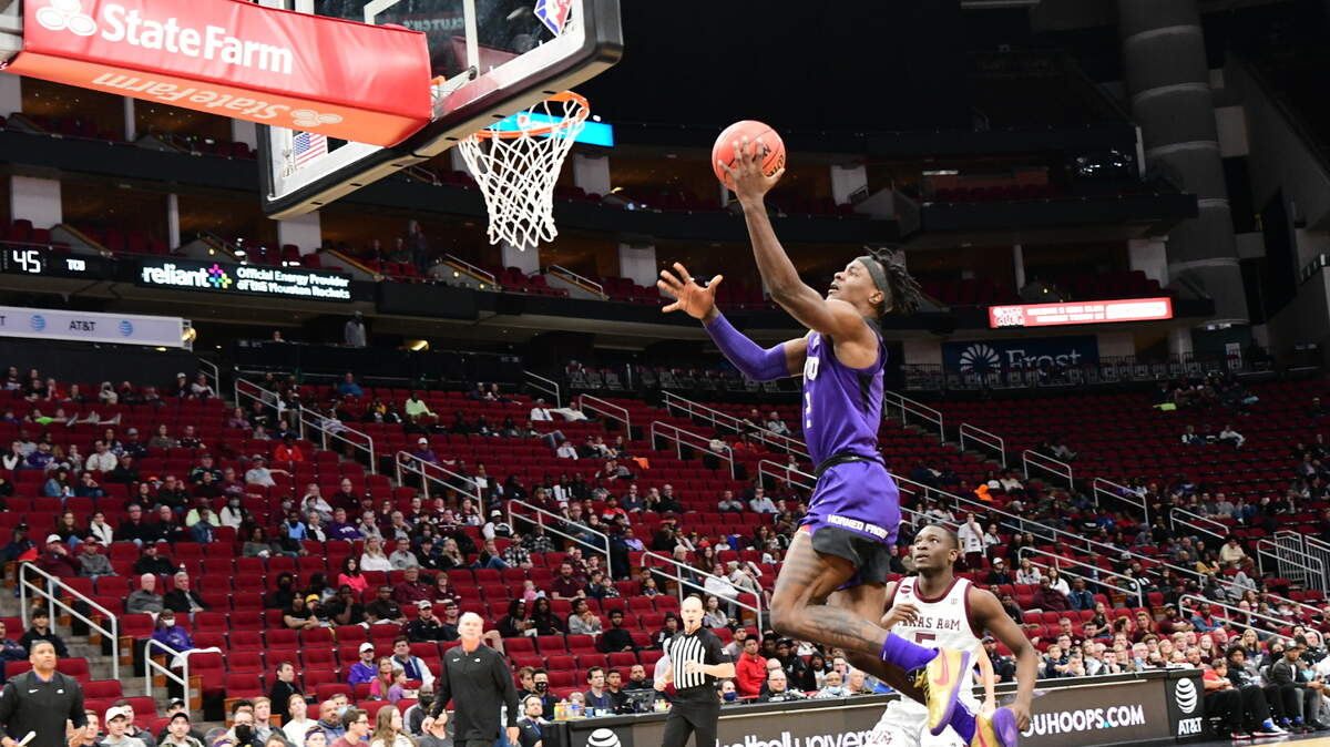 TCU guard Emanuel Miller, who transferred from Texas A&M after leading the Aggies in scoring last season, had 11 of his 13 points in the Horned Frogs 68-64 win over the Aggies Saturday night at Toyota Center in Houston.