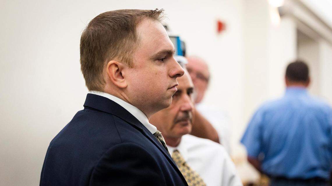 Aaron Dean walks into the courtroom for a recusal hearing on Judge David Hagerman’s status in the case Thursday, June 23, 2022, in Fort Worth.