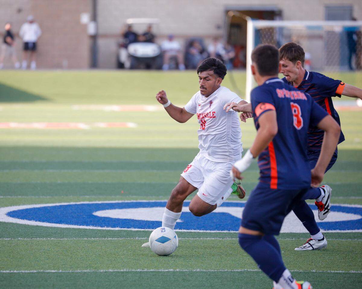 A Duncanville player attacks the Seven Lakes defense in a Class 6A state semifinal game at Birkelbach Field in Georgetown, Texas on April 12, 2024.