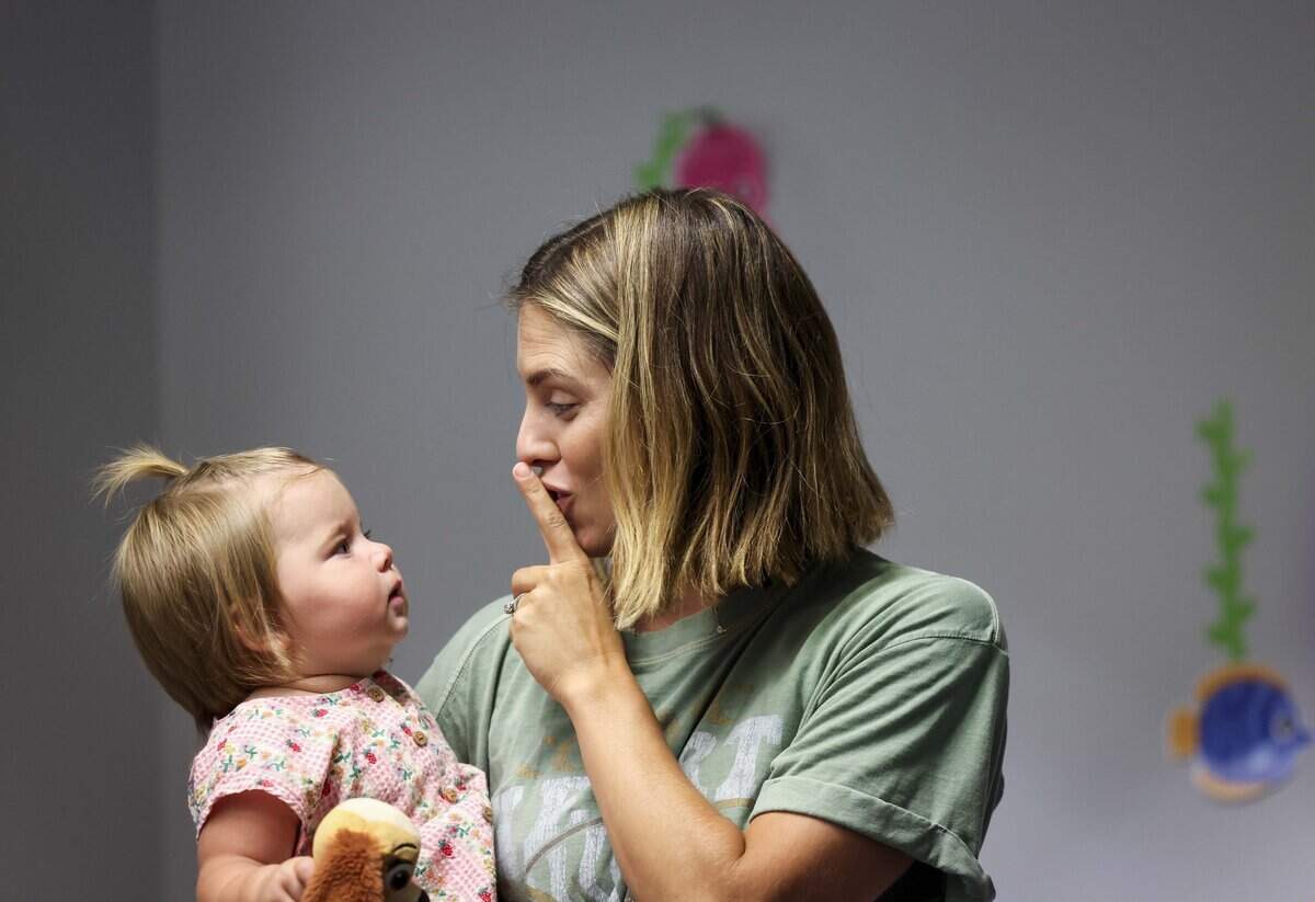 Natalie Redmon and Letty, 1, sing along to a song during Music and Movement class at the Southwest Regional Library on Thursday, July 9, 2026 in Fort Worth. The program designed for 3 to 5 year olds usually takes place from 10:30 to 11:15 a.m. on Thursdays.