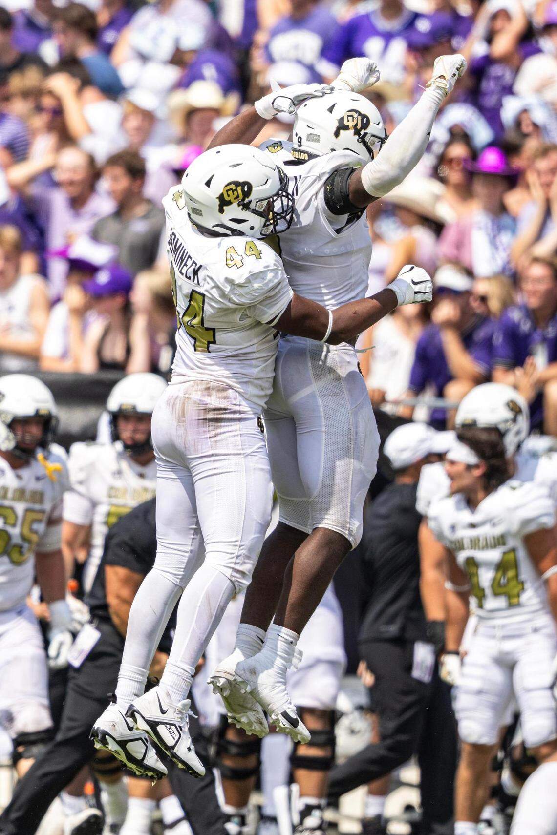 Colorado defensive players celebrate after winning their season opener 45-42 against the TCU Horned Frogs at Amon G. Carter Stadium in Fort Worth on Saturday, Sept. 2, 2023.