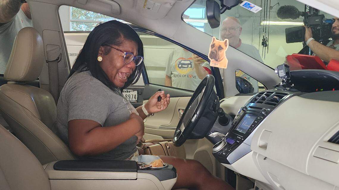 Ashley Thomas of Euless can’t believe she was given a free 2013 fully refurbished Toyota Prius. The young mother of a 1-year-old was this year’s recipient in the Autos of Love giveaway. Ashley Thomas of Euless can’t believe she was given a free 2013 fully refurbished Toyota Prius. The young mother of a 1-year-old was this year’s recipient in the Autos of Love giveaway.