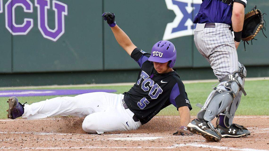 TCU's Adam Oviedo slides safely to give the Horned Frogs a 5-1 lead over Stephen F.Austin University in the first inning of Tuesday night at Lupton Stadium. TCU won 15-5.