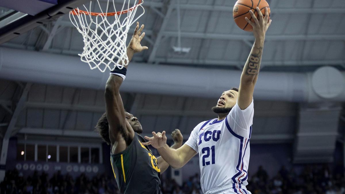 TCU forward JaKobe Coles shoots during the Horned Frogs’ game against Baylor on Feb. 11 at Schollmaier Arena in Fort Worth.