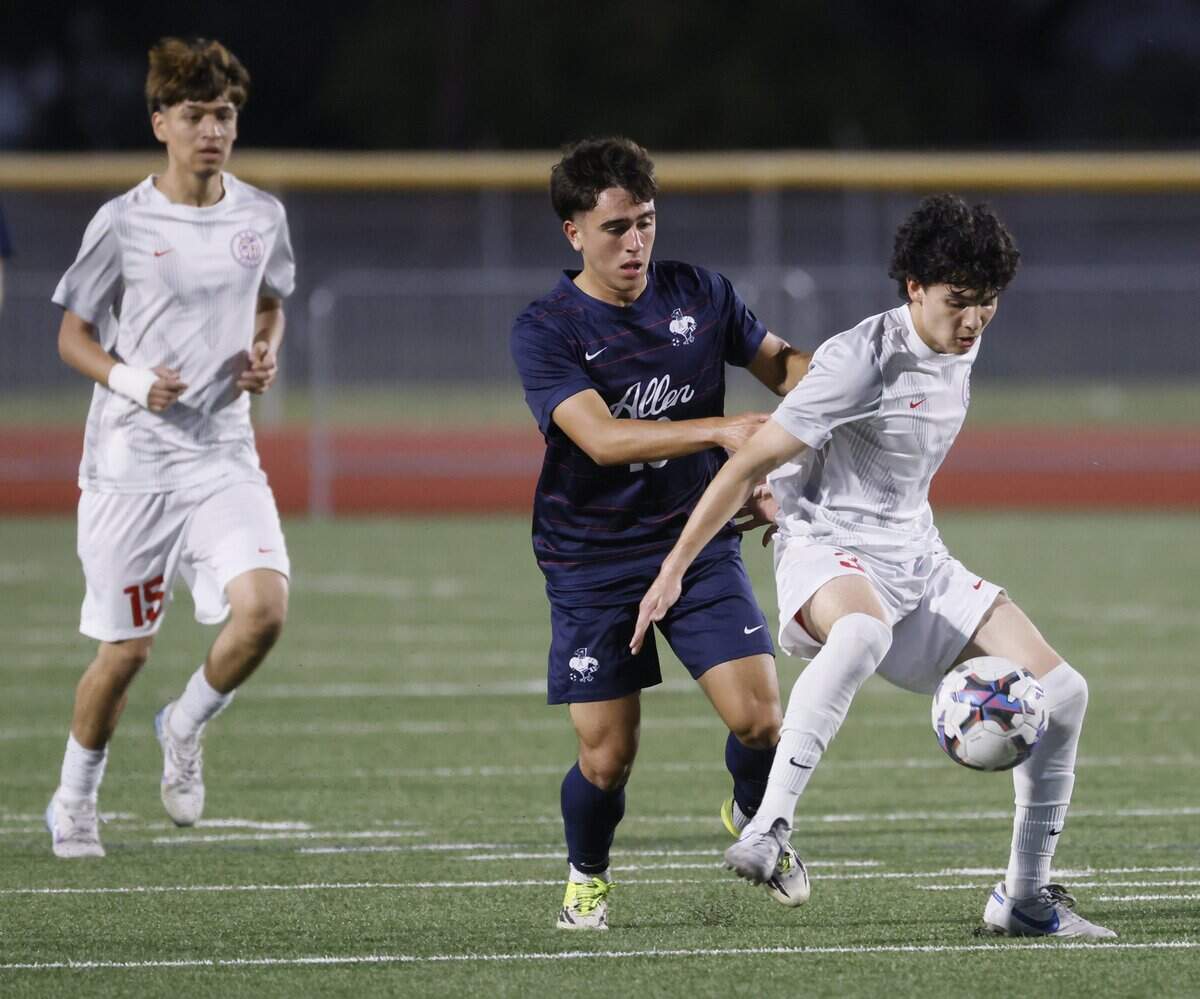 Arlington Sam Houston Marko Rabanal (2) intercepts the ball in front of an Allen defender during the first half of a UIL area round boys soccer playoff game at Tommy Standridge Stadium in Carrollton, Texas, Tuesday, March 24, 2026.