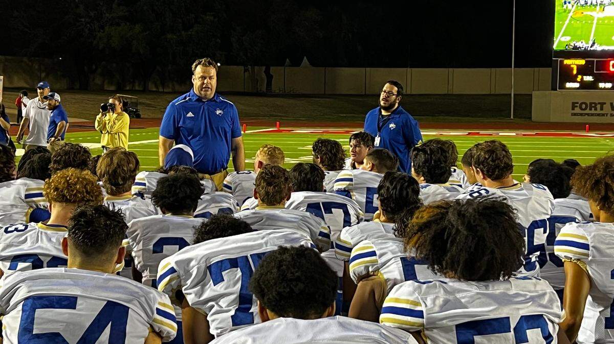 Saginaw Boswell head coach Wes Weaver speaks to his team after a win on Thursday at Farrington Field.