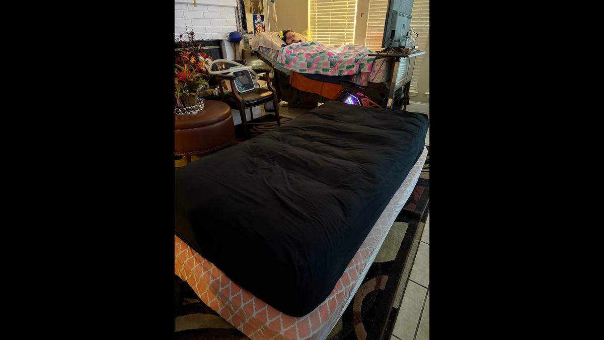 Maher Tarabishi has slept on mattresses near his son Wael for years as he cares for Wael, who has Pompe disease.