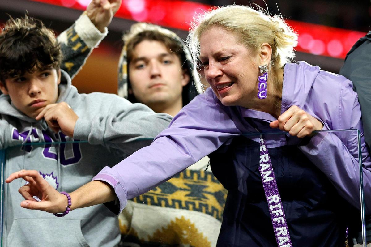 A fan thanks the TCU football team as they leave the field after losing to Georgia during the College Football Playoff National Championship on Monday, Jan. 9, 2023, at SoFi Stadium in Inglewood, Calif. The Bulldogs beat the Horned Frogs, 65-7.
