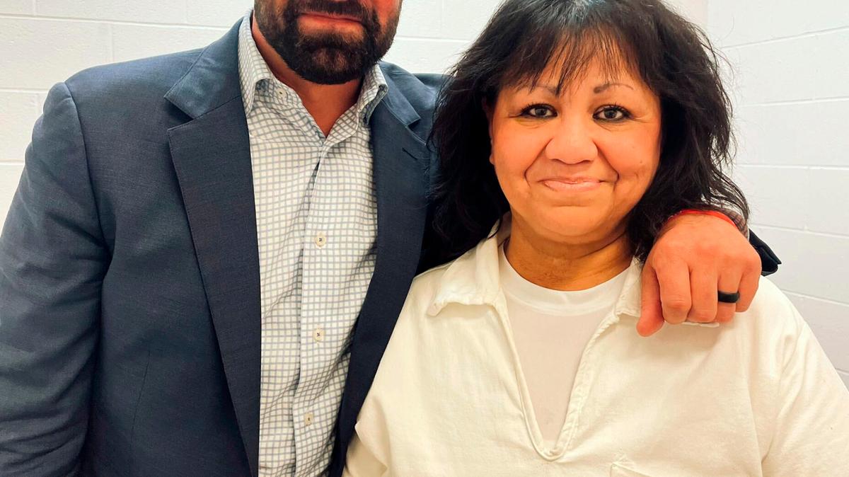 In this April 6, 2022 photo provided by Texas state Rep. Jeff Leach, Rep. Leach stands next to death row inmate Melissa Lucio during a visit by a group of seven lawmakers to the Mountain View Unit in Gatesville, Texas. The lawmakers visited Lucio to update her about their efforts to stop her April 27 execution. The lawmakers say they are troubled by Lucio’s case and believe her execution should be stopped as there are legitimate questions about whether she is guilty. (Texas state Rep. Jeff Leach via AP)