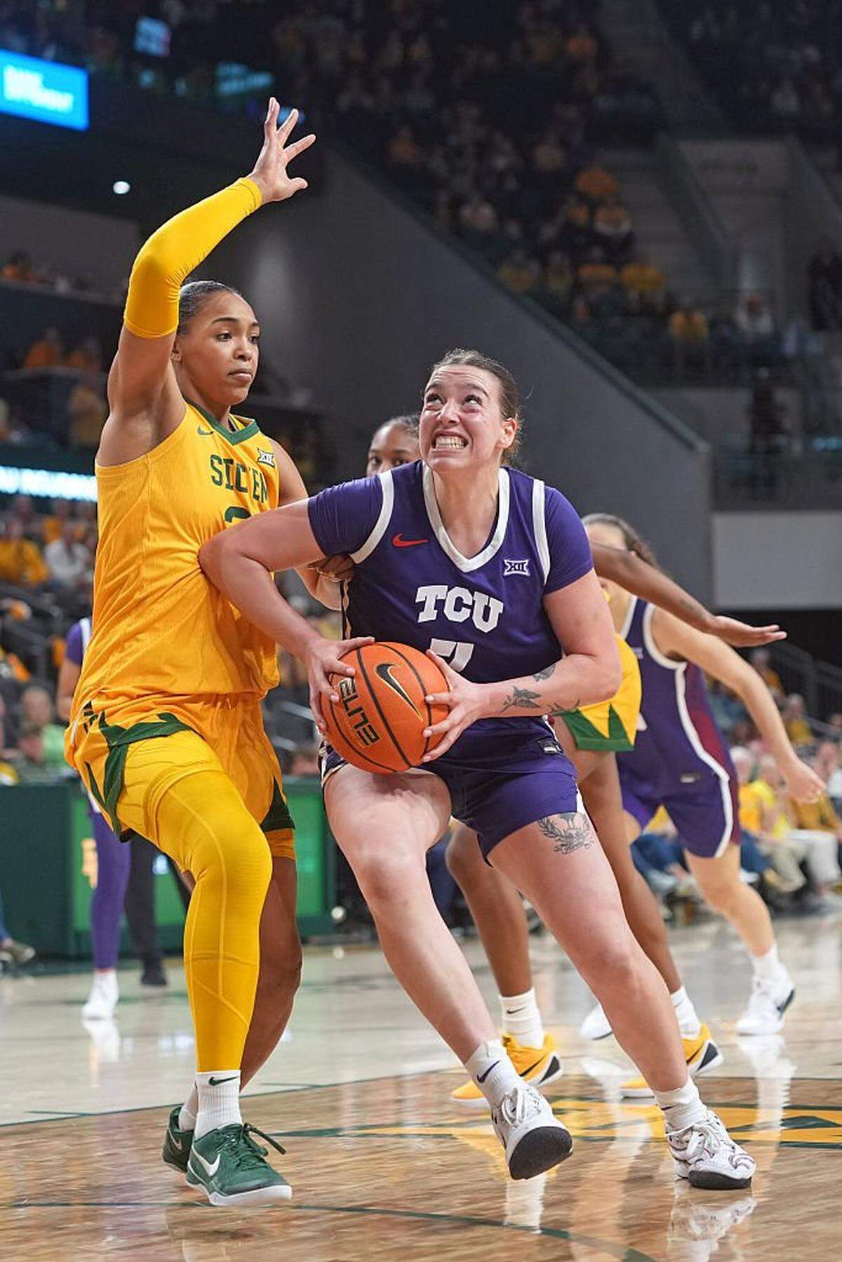 WACO, TEXAS - FEBRUARY 12: Marta Suarez #7 of the TCU Horned Frogs drives to the basket against Bella Fontleroy #22 of the Baylor Bears during the second half at Foster Pavilion on February 12, 2026 in Waco, Texas. (Photo by Scott Wachter/Getty Images)