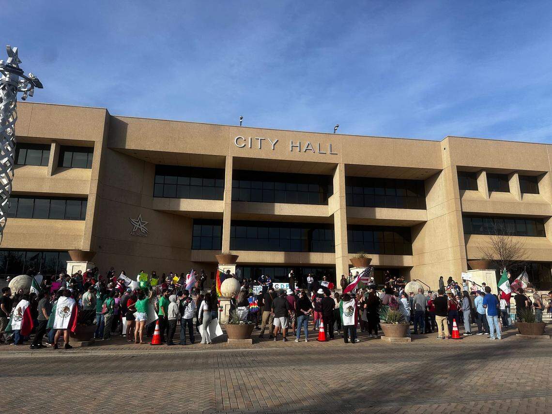 The Tarrant County Democratic Party organized a protest and rally on Sunday, Feb. 2, 2025, outside Arlington City Hall, where hundreds gathered to voice their opposition to mass deportation.