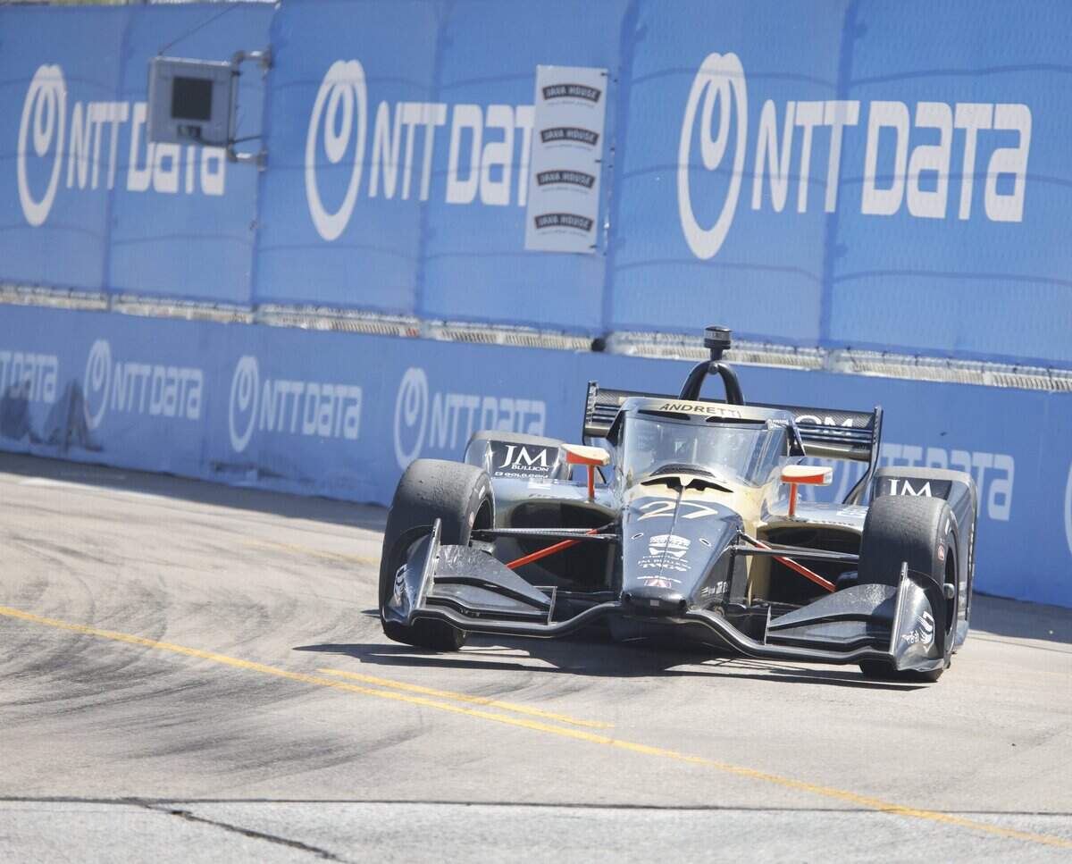 Kyle Kirkwood (27) slides through turn 14 during the inaugural Java House Grand Prix of Arlington in Arlington, Texas, Sunday, March, 15, 2026.