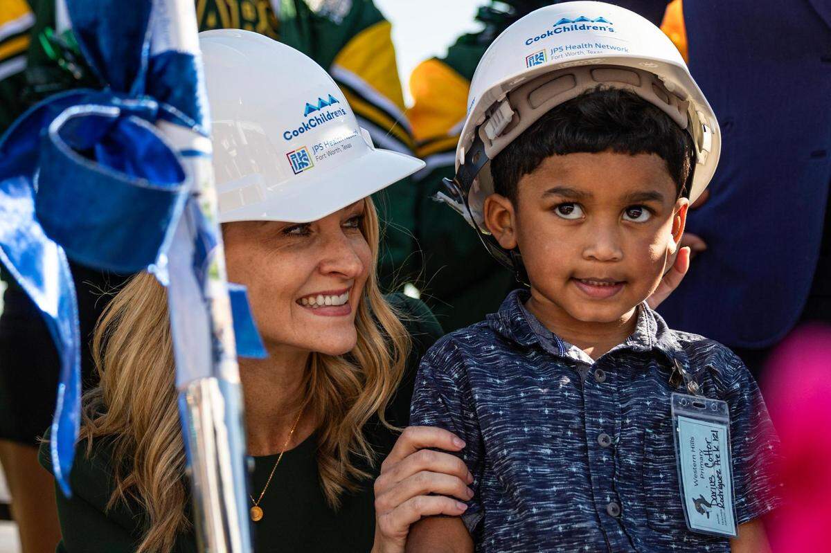 Mattie Parker, the Mayor for the City of Fort Worth, speaks with Western Hills pre-k student Darius Cotter, 4, during the groundbreaking ceremony for the Las Vegas Trail Neighborhood Health Center in Fort Worth on Tuesday, Nov. 14, 2023.