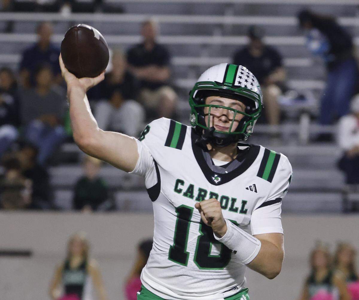 Southlake quarterback Preston Perazzo (18) tosses a quick sidelines pass during the second half of a UIL football game between Carroll and L.D. Bell at Pennington Field in Bedford, Texas, Friday, October, 24, 2025.