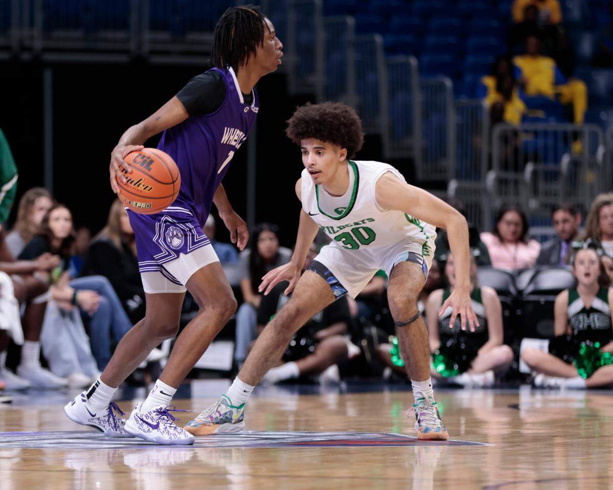 Kennedale senior Jackson Stingley defends a ballhander in the Class 4A D2 state championship against Wheatley at the Alamodome in San Antonio on Friday, March 7, 2025.