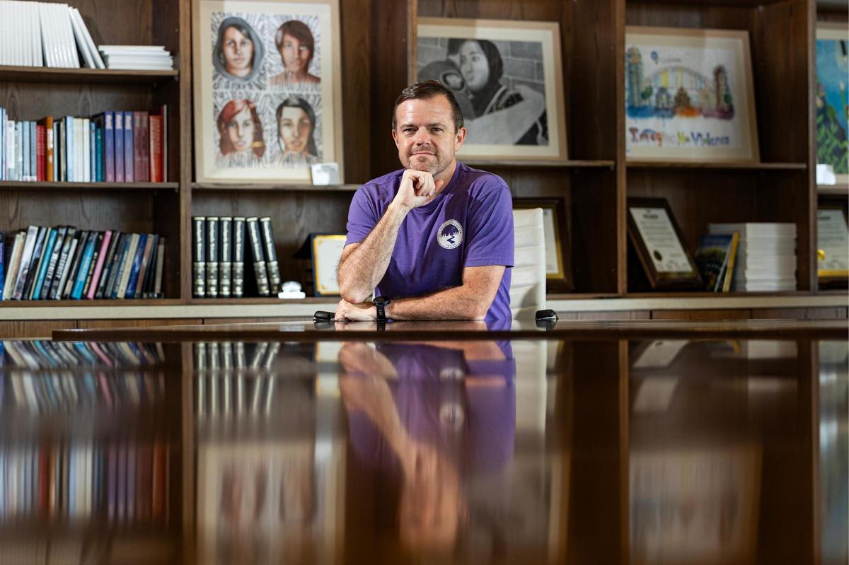 Ken Shetter, the president of One Safe Place, is photographed in one of the conference rooms at the One Safe Place facility in Fort Worth on Sept. 20, 2024. One Safe Place includes a domestic abuse treatment center where patients can come seek guidance from a professional counselor and participate in the many programs for specialized support.