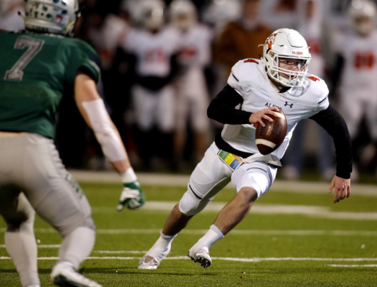 Aledo quarterback Jake Bishop (4) cuts back to the left in the second half of a high school 5A Division II Quarter Finals football playoff game at Northwest ISD Stadium, Justin, Texas, Saturday, Dec. 08, 2018. Aledo handed Frisco Reedy their first loss of the season at 26-16. (Star-Telegram Bob Booth)