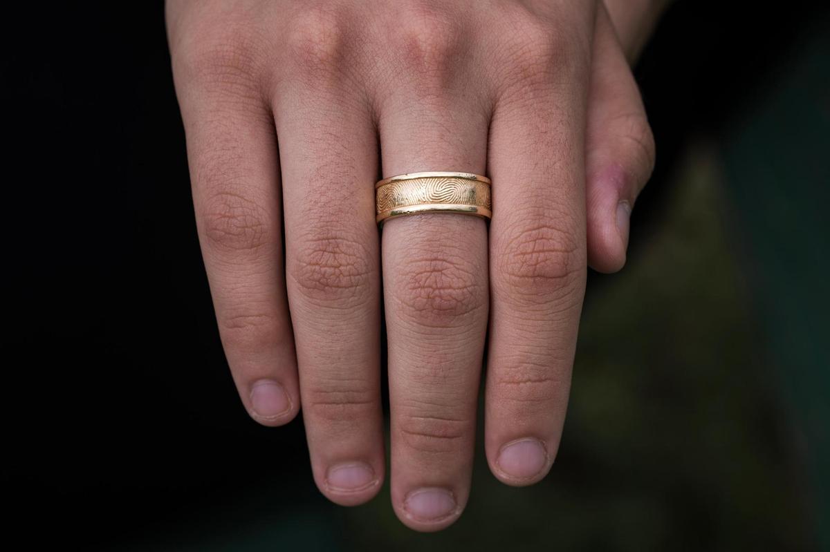 Mia Dominguez wears a ring with the finger print of her sister, who died from an overdose in 2022. A social media feud over her sister’s death led to a shooting outside of a Whataburger across from Paschal High School in January 2023.