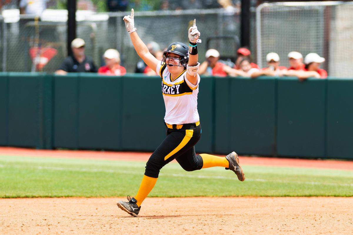 Forney junior Trinity Cannon hits a two-run home run in the top of the eighth inning vs. Angleton, Friday May 31, 2019.