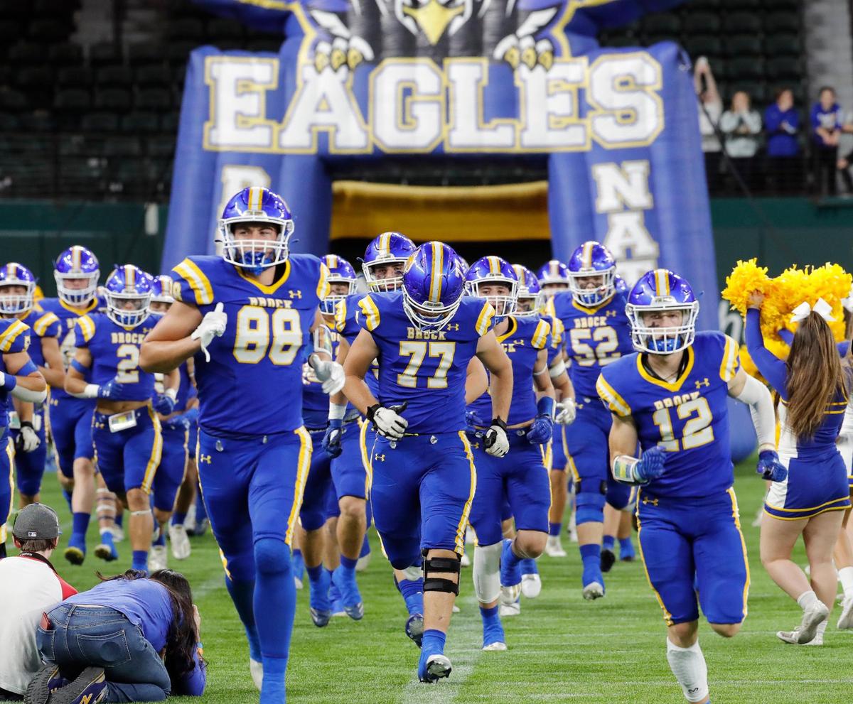 The Brock Eagles take the field for a high school Class 3A Division 1 Quarterfinals playoff game at Globe Life Field in Arlington, Texas, Thursday, Dec. 02, 2021. Brock led 28-0 at the half. (Special to the Star-Telegram Bob Booth)