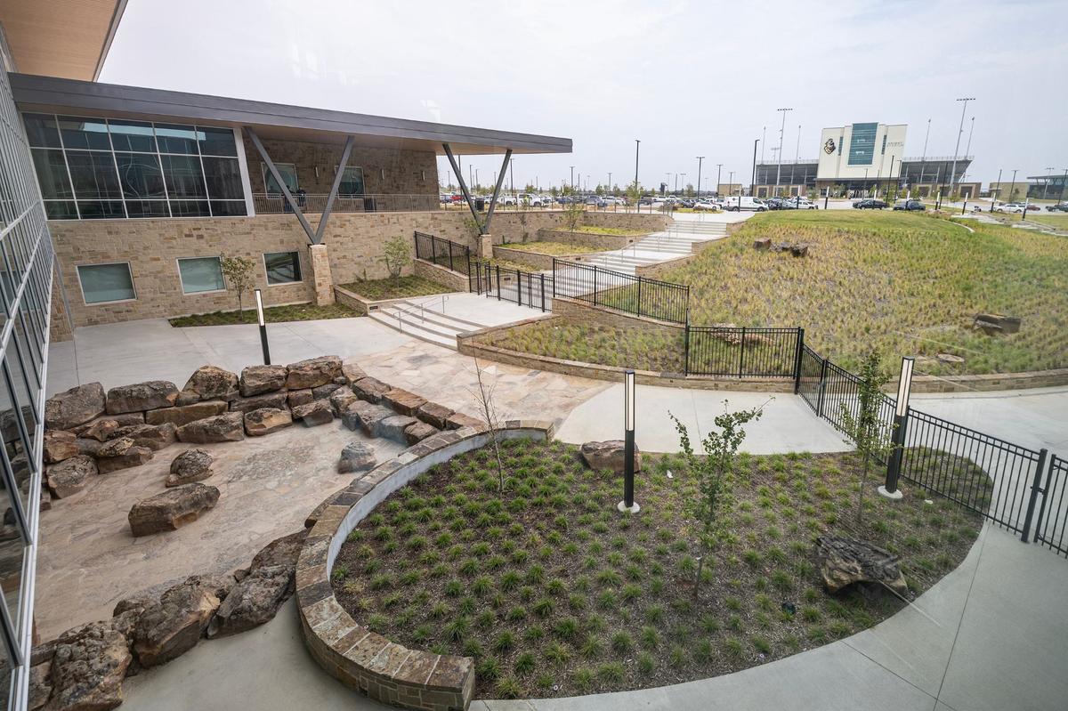 The courtyard view from the second floor overlooking the entrance to Knight Stadium on the campus of Eagle Mountain High School.
