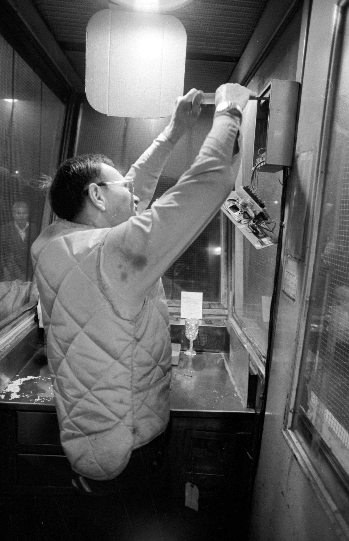 Jan. 1, 1978: Dallas-Fort Worth Turnpike employee James Toler working in a booth after the demise of toll collections.